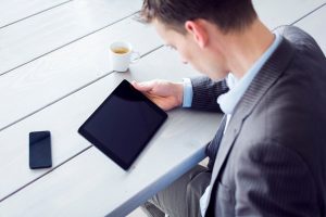 Businessman working on the tablet