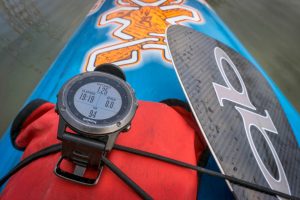 Multisport Garmin GPS watch on paddleboard